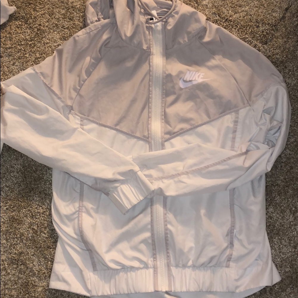 All white and silver Nike sweater